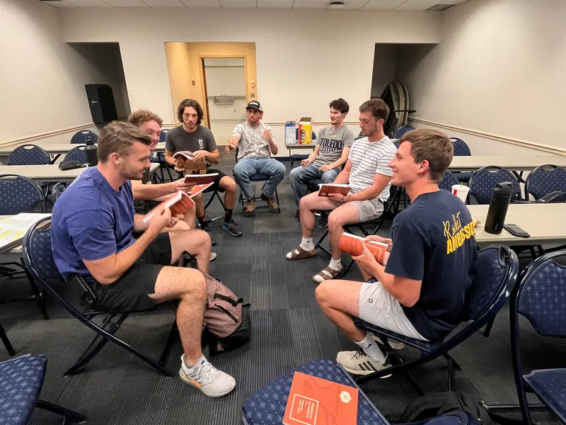 Campus Forge men doing a Bible study together